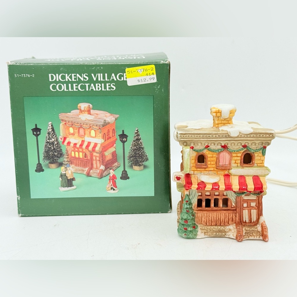 Holiday House with Red and Green Accents Dicken’s lighted house Christmas decor